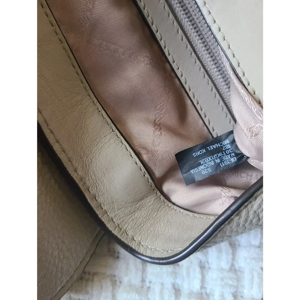 Michael Kors Pebbled Leather Backpack in Light Cream with Gold Hardware
